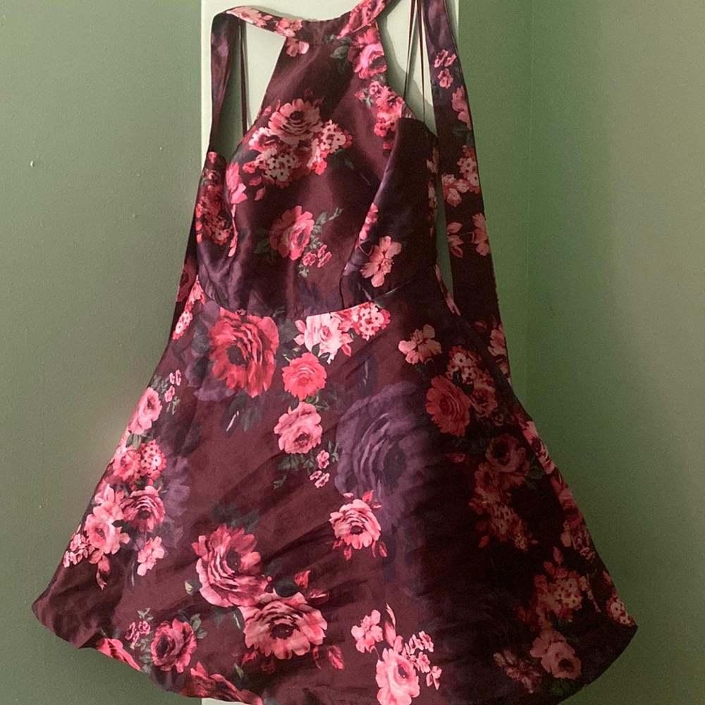 a wine red floral dress.